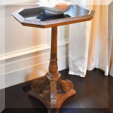 F05. Antique octaganol pedestal side table with black glass top c.1880. 27”h x 20”w x 19”d 